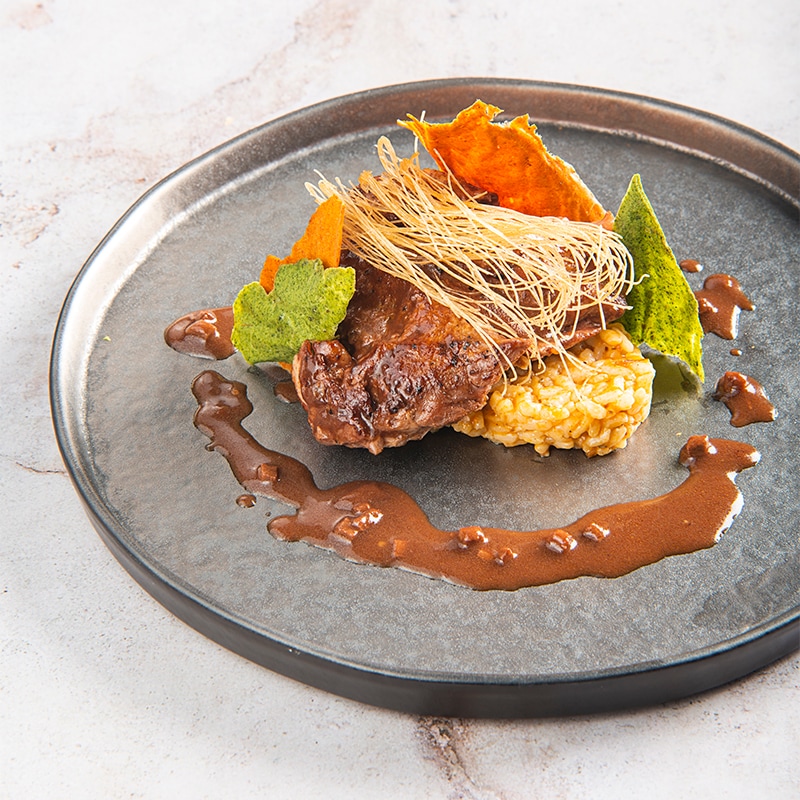 Свински джолан със зеленчуково ризото и сос "Еспаньол"